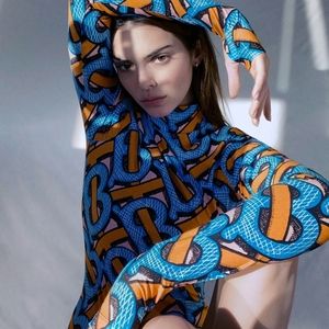 SOLD!!! 100% AUTHENTIC Burberry (TB) monogram bodysuit shirt (SOLD SOLD!!!)